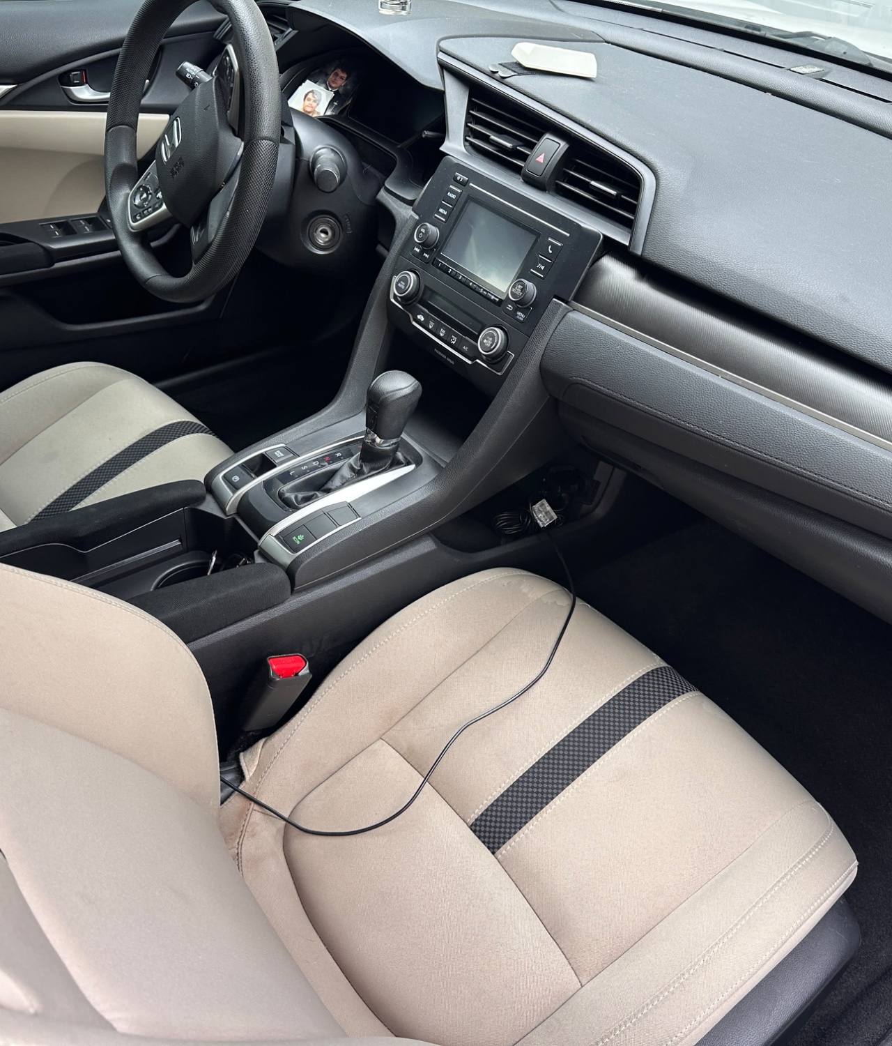 Honda Civic AFTER interior detail by Detail Jockey — deep cleaned stain-free beige cloth seats, shampooed upholstery and vacuumed front carpet, NJ⁠