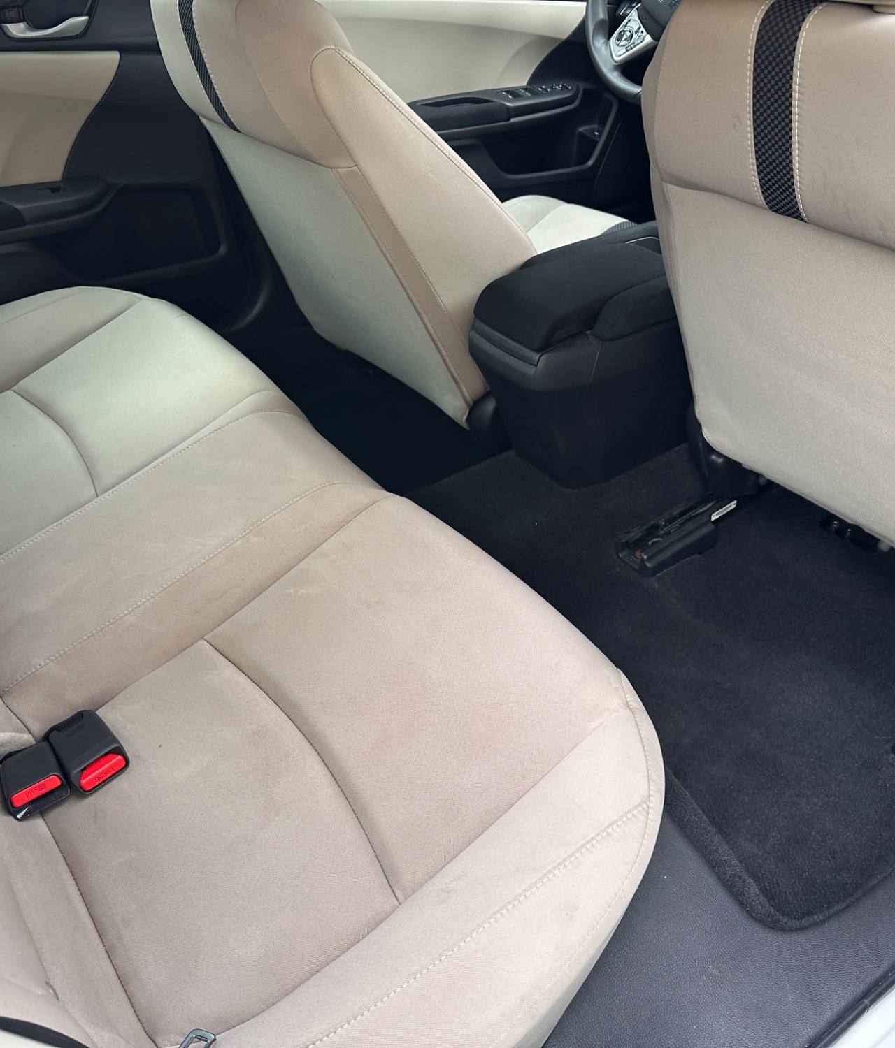 Honda Civic AFTER interior detail by Detail Jockey — deep cleaned stain-free beige cloth seats, shampooed upholstery and vacuumed rear carpet, NJ⁠