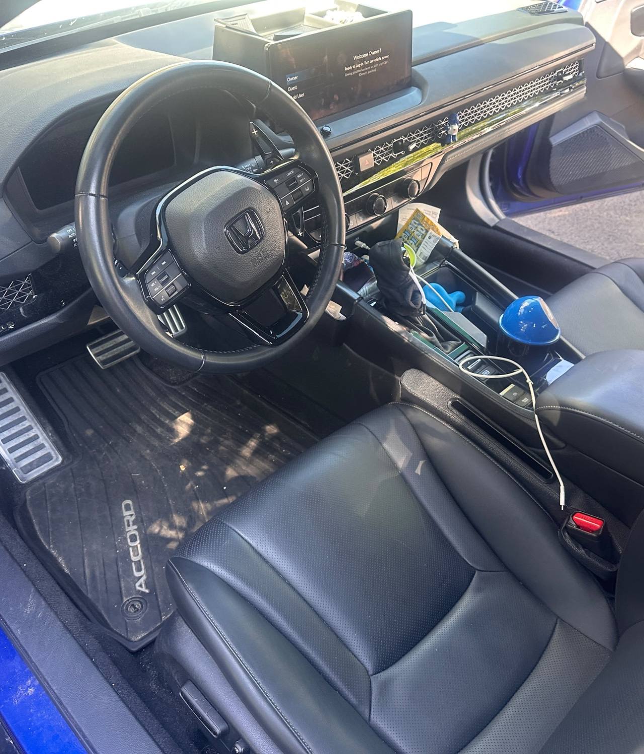 Blue Honda Civic BEFORE interior detail by Detail Jockey — cluttered center console, dusty floor mat and messy driver seat area, NJ⁠