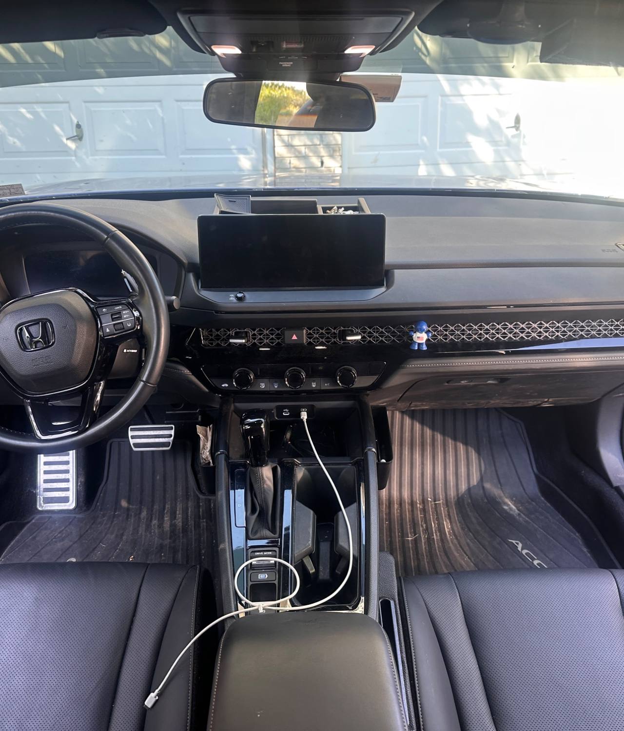 Blue Honda Civic BEFORE interior detail by Detail Jockey — dusty dashboard, dirty rubber floor mats and uncleaned steering wheel, NJ⁠
